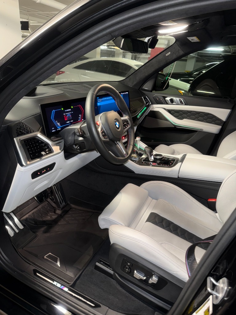BMW X5M interior detail white leather seats dashboard spotless mobile detailing Chicago